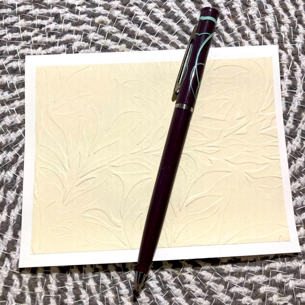 Cream and white embossed cards
